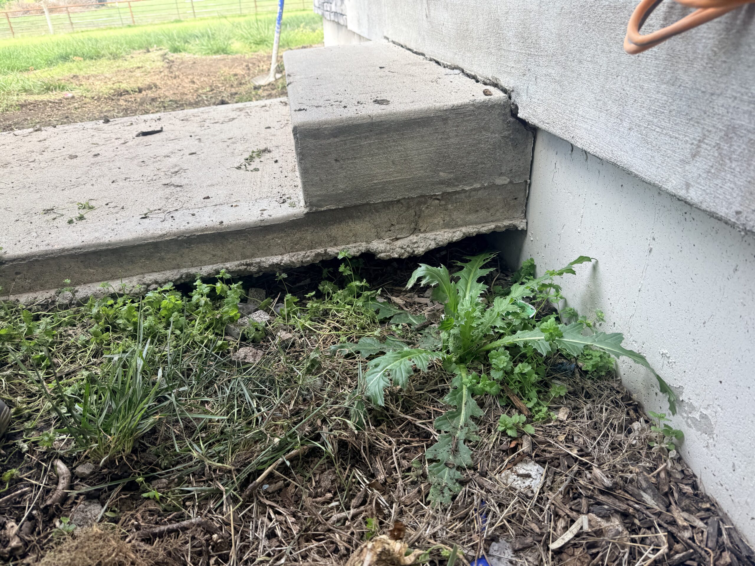 Void under walkway that needs filled in Oak Grove, MO
